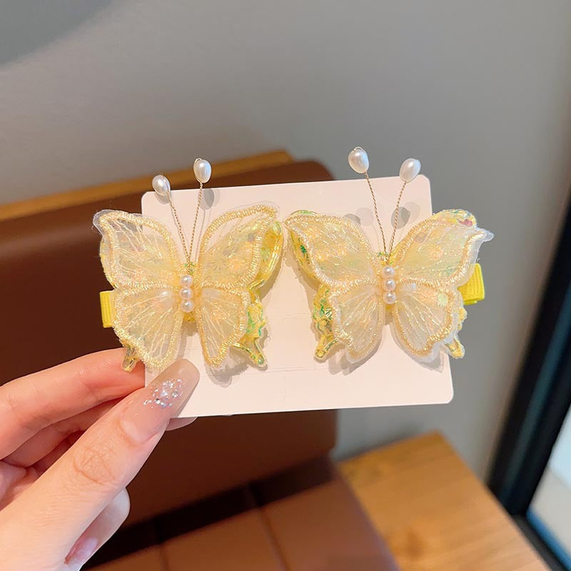 SET DE 2 CLIPS PARA CABELLO BUTTERFLY | AMARILLO