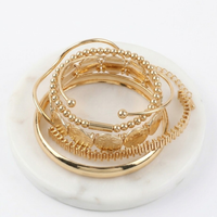 Set De 5 Pulseras Doradas