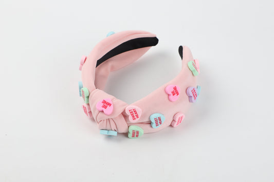 Vincha rosada con diseño